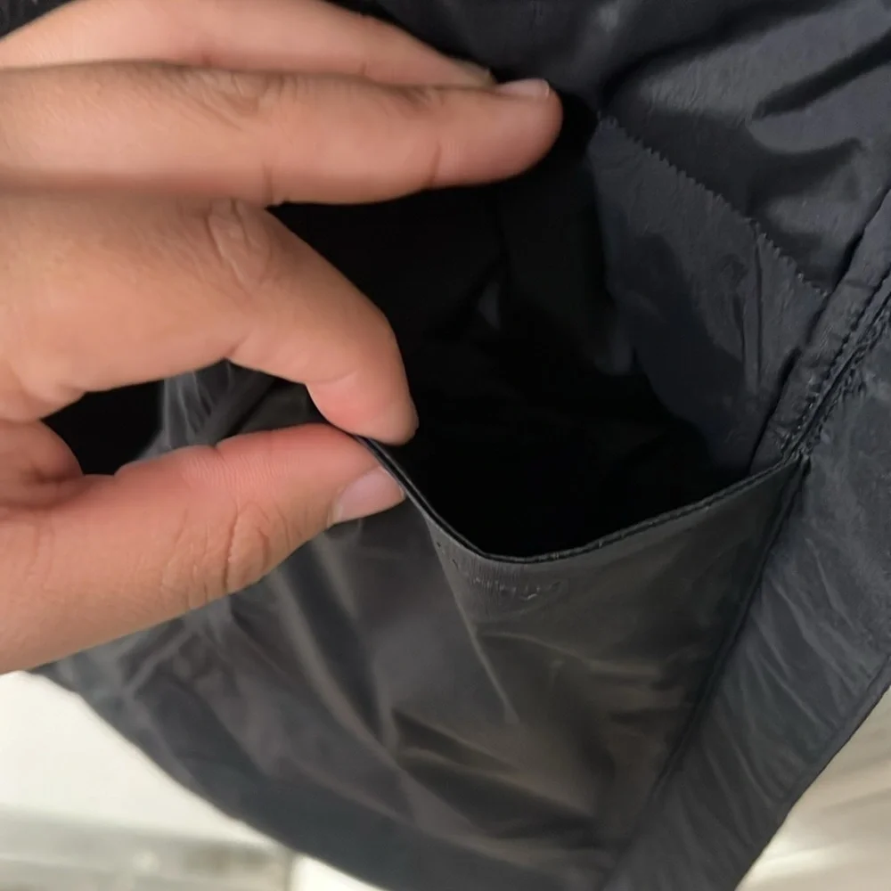 Lululemon Black Sleeveless Jacket with Embroidered Patch